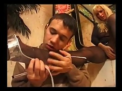 Hot milf gives a footjob with black pantyhose